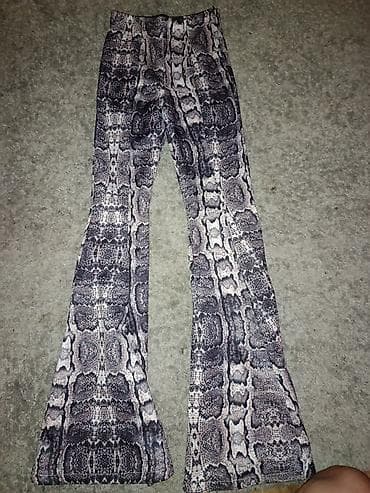 Ženske pantalone Blondy – zmijski print, zvonare - Brend: Blondy