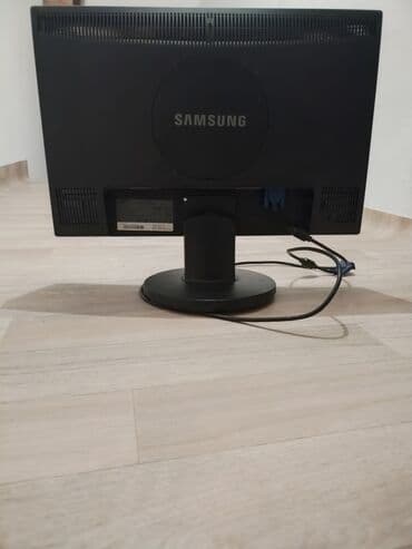 fen za kosu singer: Crni Samsung monitor modela 2243NW, pogodan za svakodnevnu upotrebu — 2