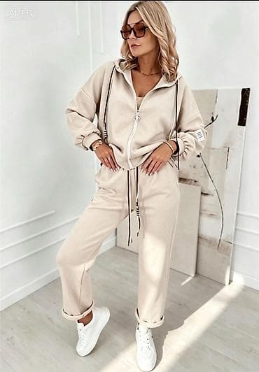 roze tn: Ženski komplet trenerke sa kapuljačom – 2 dela

-3400din
SM L XL — 3