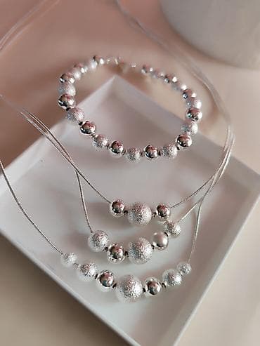 prada ogrlica: Set nakita žig 925 Elegantni srebrni set zig 925, sastavljen od: - — 5