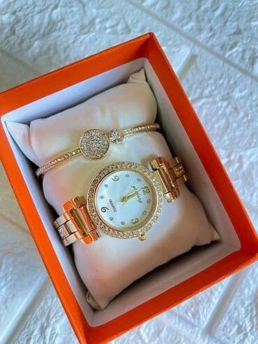 tommy hilfiger d: Narukvica i sat 
2500 din — 2