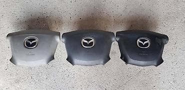 Car Interior Parts: AIRBAG VAZDUSNI JASTUK ZA MAZDA 323 — 1