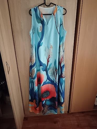 svaštarica haljine: Letnja haljina bez rukava sa A-krojem, svetloplavе podloge i — 1