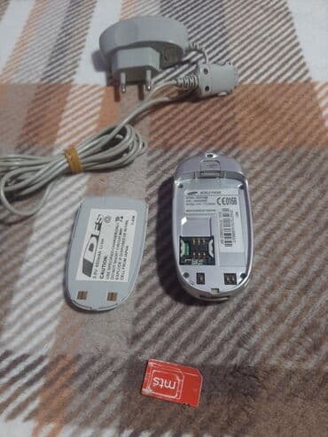 samsung punjač: Samsug sgh x460 ispravan telefon radi na sve mreze,baterija — 12