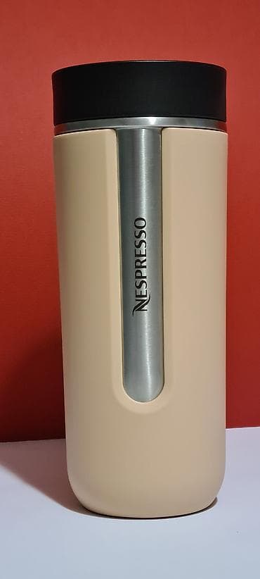 kante za smece: Nespresso Nomad termo putna šolja u krem boji.  - Materijal: Nerđajući — 1