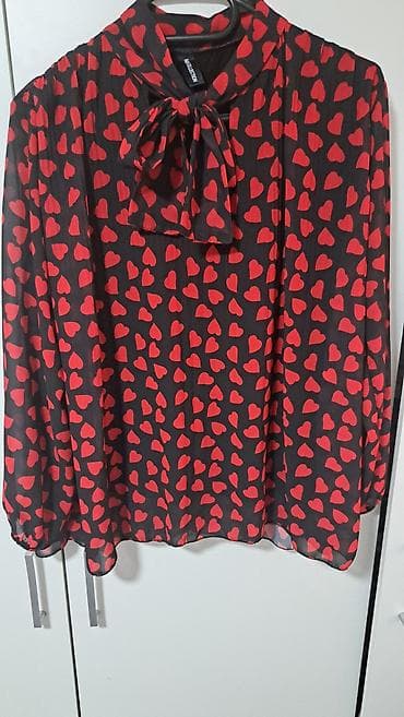 Nova tunika-kosulja.

Jednom nosena. Velicina M,L moze i XL — 2