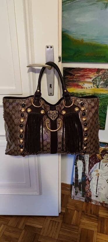 Ostali aksesoari: Gucci. Fantastična.

Bez ikakvih nedostataka.
45cm x 28cm x 10cm — 11