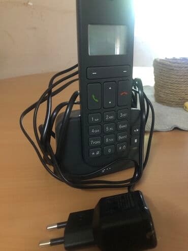 Landline Phones: Bežični telefon crne boje, dolazi sa baznom stanicom i punjačem — 1