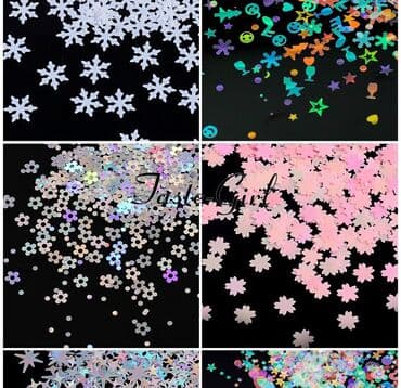 Donji delovi trenerke: Novogodisnji set za ukrasavanje nokta 12u1 
Cena: 390din — 5