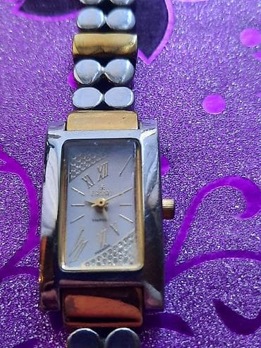 Damski ručni sat Esprit, elegantnog pravougaonog kućišta i dvo-bojne