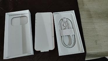 Mobile Phones & Accessories: IPhone – bakarno/narandžasta boja Opis: - Ekran sa “Dynamic Island” — 4