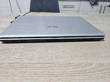 inspiron 1545: ASUS laptop (serija U/UL) – srebrno kućište sa crnim detaljima — 3