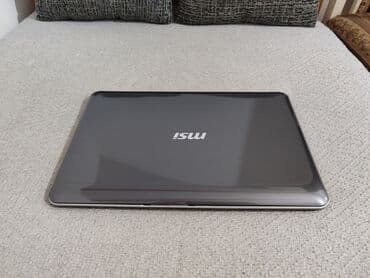 Računarska oprema: Intel Core i5, 4 GB OZU, 15.6 " — 4
