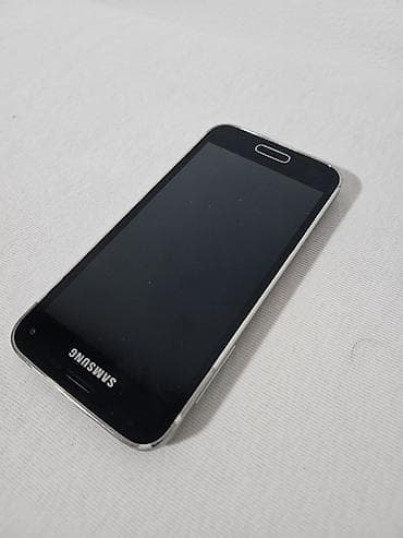 pixi 4: Na prodaju Samsung Galaxy S5 mini u crnoj boji. Telefon je fizički — 4