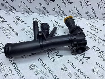 auto delovi loznica: TERMOSTAT SA RACVOM ZA VOLKSWAGEN TIGUAN, TOURAN, GOLF 7 . - 04L 121 — 3