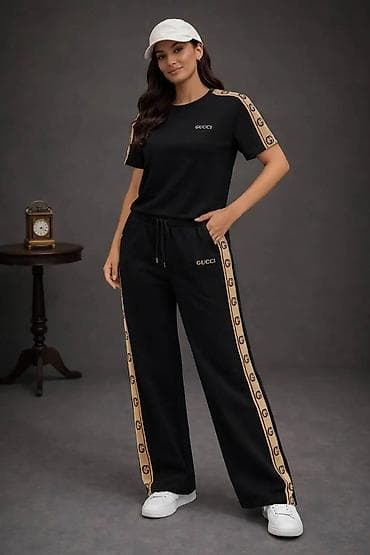 torbe mona: Damski dvodelni komplet – majica i pantalone sa širokim nogavicama — 4