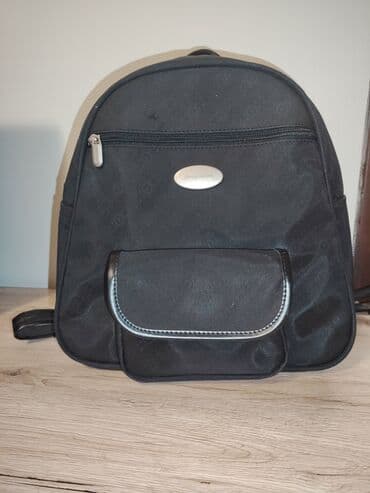 Crni Samsonite mini ranac - Brend: Samsonite (metalna pločica sa na lalafo.rs Crni Samsonite mini ranac - Brend: Samsonite (metalna pločica sa