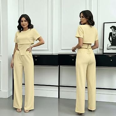 ps kombinezoni 2022: Komplet – top i pantalone sa širokim nogavicama
3000 din — 2