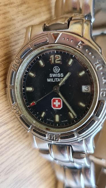 Dva muška ručna sata – nerđajući čelik 1) Swiss Military (Swiss Made) na lalafo.rs Dva muška ručna sata – nerđajući čelik 1) Swiss Military (Swiss Made)