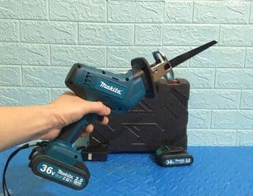 Akumulatorske testere: Makita aku testera lisicarka 36v dve baterije + 4 testere Cena — 1