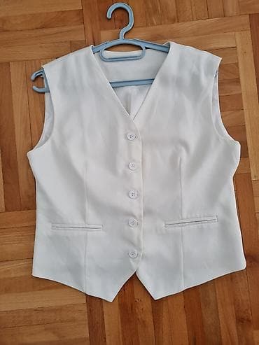 Beli ženski prsluk – elegantan, bez rukava, V-izrez - Klasičan kroj sa na lalafo.rs Beli ženski prsluk – elegantan, bez rukava, V-izrez - Klasičan kroj sa