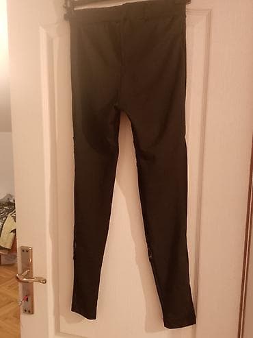 Women's Clothing: Crne ženske helanke sa dekorativnim detaljima - Model: uske helanke — 3