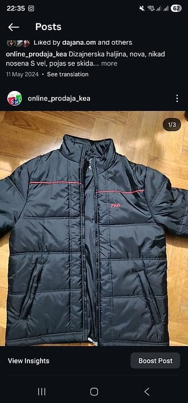 FILA zimska jakna, crna, sa diskretnim crvenim detaljima i logom na na lalafo.rs FILA zimska jakna, crna, sa diskretnim crvenim detaljima i logom na