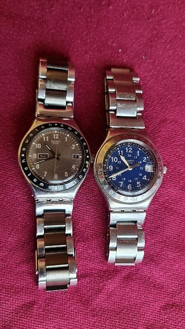 Swatch metalni ručni satovi – 2 komada - Brend: Swatch (Swiss) - na lalafo.rs Swatch metalni ručni satovi – 2 komada - Brend: Swatch (Swiss) -
