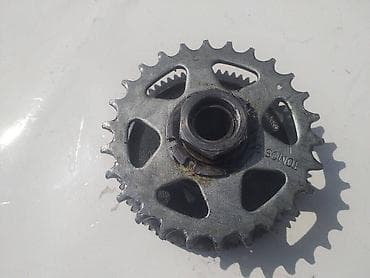 pracka sa laserom: Pogonski zupcanik i prednji zupcanik sa lancanikom automatik a 3 — 4