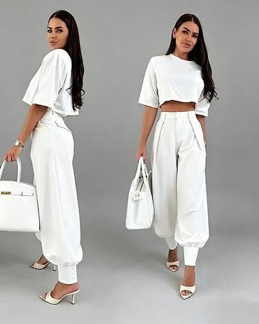 wurth pantalone: Ženske pantalone sa širokim nogavicama i manžetnama
2300 din 
S M L — 4