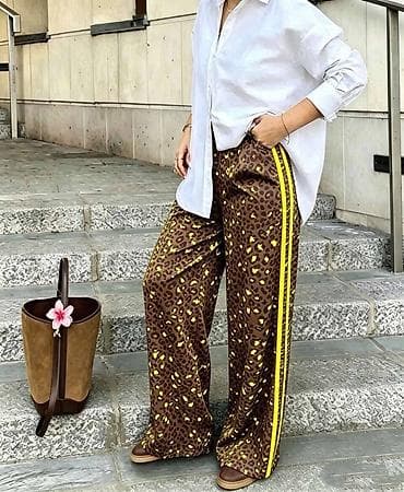 Pantalone: 🔥Ženske široke pantalone sa animal printom i bočnim prugama
✅2400 din — 2