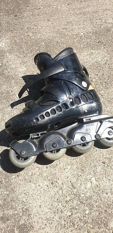 Roleri i rolšue: Agresiv polovni roleri, sa gumenim točkovima, marka rolera je BCN — 1