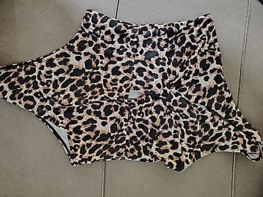 Jednodelni ženski kupaći kostim sa leopard šarom. - Kroj: asimetrični
