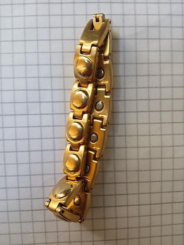 Zlatno-tonirana narukvica sa segmentima - Dizajn: masivni članci