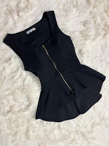 Elegantna crna peplum bluza bez rukava - Materijal: glatka tkanina sa
