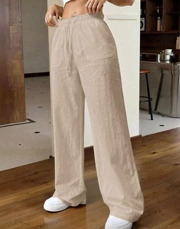 Ženske široke lanene pantalone bež boja. - Materijal lan. - Kroj