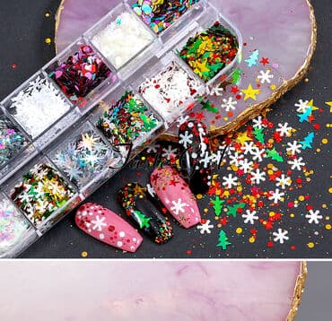 Donji delovi trenerke: Novogodisnji set za ukrasavanje nokta 12u1 
Cena: 390din — 1