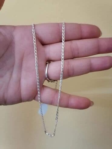 ogrlica sa detelinom: Dimenzije 50cmx2mm
Cena 1700din — 1