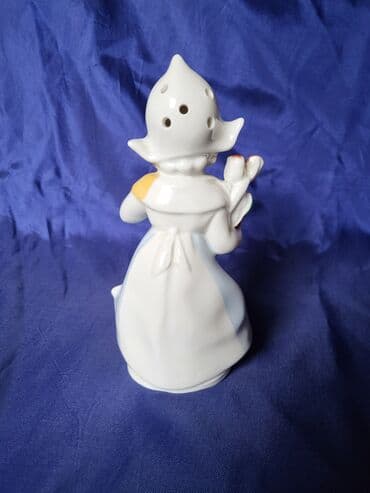 flase sa natpisom: Figura nova,vintaz,holandjanka sa lalama porcelanska. Nova — 10
