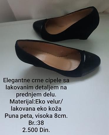 Elegantne crne cipele sa lakiranim detaljem na prednjem delu