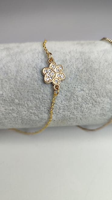 Novčanici: Zlatna narukvica sa medenjak-priveskom u obliku deteline/ cveta — 1