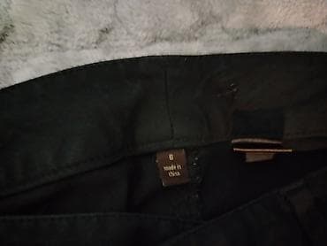 duboke pantalone prodaja: Crne ženske uske pantalone (skinny/strejt kroj) - Boja: crna - Model — 1