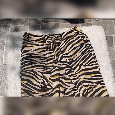 pantalone 44: F&F Naznacena vel.38 Poluobim struka od 36 do48 (imaju lastis — 2