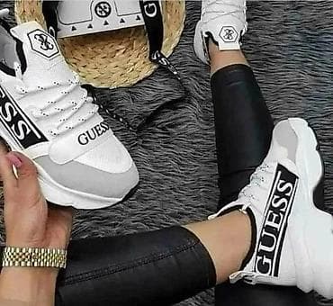 skecers patike: Ženske patike Guess – bele sa crnim detaljima i izraženim GUESS logom — 1