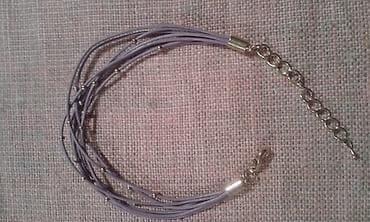 Ljubicasta narukvica od tankih koznih niti sa zlatastim na lalafo.rs Ljubicasta narukvica od tankih koznih niti sa zlatastim