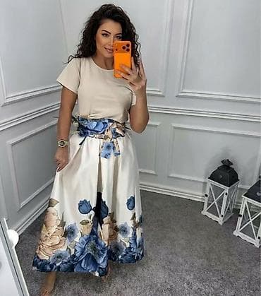 svečane suknje za punije: ✨Svečana midi suknja sa cvetnim dezenom i pojasom
S m L
Cena 2600 din — 2