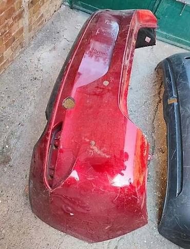 Vozila: BRANIK CRVENI ZA MAZDA 3 | Mazda 3 zadnji branik ostecen utisnit I — 1