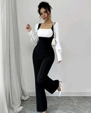 crne perike: ❤️❤️Elegantni ženski kombinezon u crno‑beloj kombinaciji.
🔥1900 din — 4
