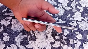 telefoni sa dve kartice: Xiaomi Redmi pametni telefon – bela boja - Ekran: veliki „punch‑hole“ — 7