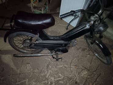 set za reparaciju menjaca golf 4: Crni moped sa braon sedištem moze da se sredi falimu samo paljenje — 1